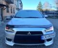 Серый Мицубиси Лансер, объемом двигателя 2 л и пробегом 229 тыс. км за 7000 $, фото 1 на Automoto.ua