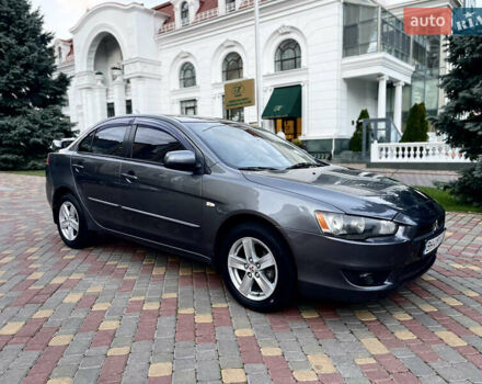 Серый Мицубиси Лансер, объемом двигателя 2 л и пробегом 212 тыс. км за 6000 $, фото 15 на Automoto.ua