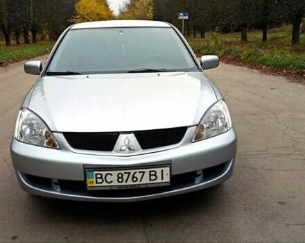 Серый Мицубиси Лансер, объемом двигателя 1.58 л и пробегом 176 тыс. км за 5000 $, фото 7 на Automoto.ua