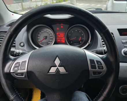 Сірий Міцубісі Lancer, об'ємом двигуна 2 л та пробігом 131 тис. км за 4899 $, фото 6 на Automoto.ua