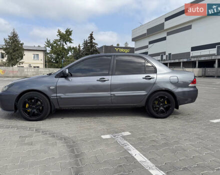 Серый Мицубиси Лансер, объемом двигателя 1.58 л и пробегом 250 тыс. км за 4300 $, фото 8 на Automoto.ua