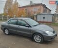 Сірий Міцубісі Lancer, об'ємом двигуна 1.58 л та пробігом 1 тис. км за 2850 $, фото 7 на Automoto.ua