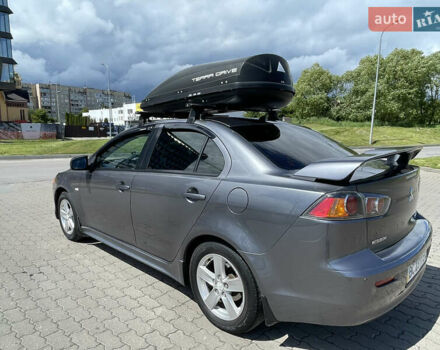 Сірий Міцубісі Lancer, об'ємом двигуна 2 л та пробігом 234 тис. км за 7200 $, фото 5 на Automoto.ua