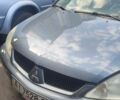 Серый Мицубиси Лансер, объемом двигателя 1.6 л и пробегом 277 тыс. км за 4000 $, фото 1 на Automoto.ua