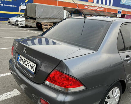 Серый Мицубиси Лансер, объемом двигателя 1.58 л и пробегом 183 тыс. км за 3800 $, фото 9 на Automoto.ua