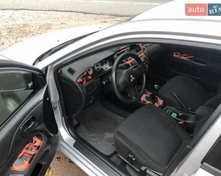 Серый Мицубиси Лансер, объемом двигателя 1.58 л и пробегом 268 тыс. км за 3450 $, фото 4 на Automoto.ua