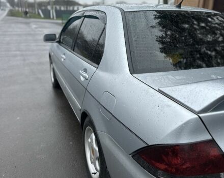 Сірий Міцубісі Lancer, об'ємом двигуна 1.6 л та пробігом 222 тис. км за 4300 $, фото 4 на Automoto.ua