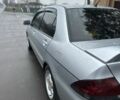 Сірий Міцубісі Lancer, об'ємом двигуна 1.6 л та пробігом 222 тис. км за 4300 $, фото 4 на Automoto.ua