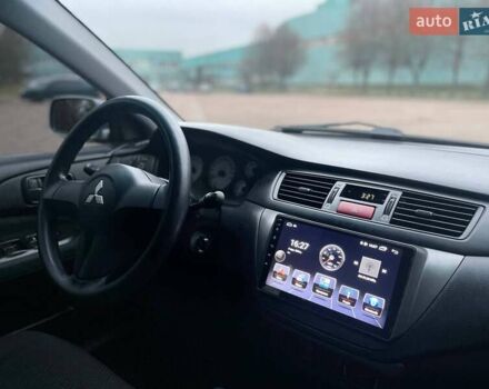 Сірий Міцубісі Lancer, об'ємом двигуна 1.6 л та пробігом 254 тис. км за 3800 $, фото 16 на Automoto.ua