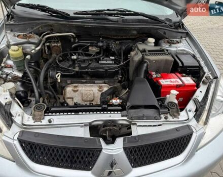 Сірий Міцубісі Lancer, об'ємом двигуна 1.6 л та пробігом 206 тис. км за 4799 $, фото 27 на Automoto.ua