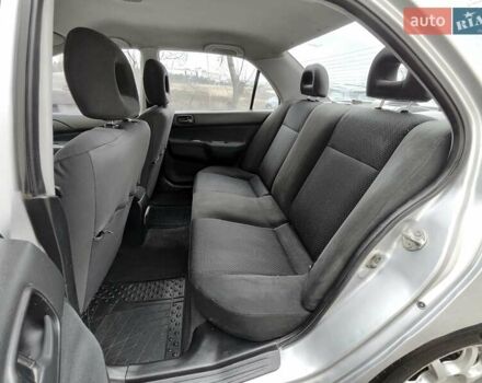 Серый Мицубиси Лансер, объемом двигателя 1.58 л и пробегом 185 тыс. км за 4700 $, фото 12 на Automoto.ua