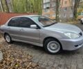 Серый Мицубиси Лансер, объемом двигателя 1.6 л и пробегом 290 тыс. км за 4800 $, фото 1 на Automoto.ua