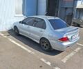 Сірий Міцубісі Lancer, об'ємом двигуна 1.6 л та пробігом 217 тис. км за 6000 $, фото 7 на Automoto.ua