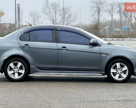 Серый Мицубиси Лансер, объемом двигателя 2 л и пробегом 203 тыс. км за 4999 $, фото 3 на Automoto.ua