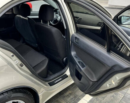 Сірий Міцубісі Lancer, об'ємом двигуна 2 л та пробігом 230 тис. км за 6800 $, фото 24 на Automoto.ua