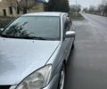 Сірий Міцубісі Lancer, об'ємом двигуна 1.6 л та пробігом 222 тис. км за 4300 $, фото 2 на Automoto.ua