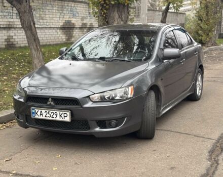 Серый Мицубиси Лансер, объемом двигателя 2 л и пробегом 240 тыс. км за 5450 $, фото 3 на Automoto.ua