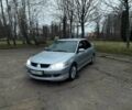 Сірий Міцубісі Lancer, об'ємом двигуна 1.6 л та пробігом 254 тис. км за 3800 $, фото 1 на Automoto.ua
