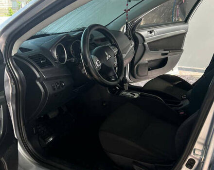 Сірий Міцубісі Lancer, об'ємом двигуна 2 л та пробігом 238 тис. км за 6400 $, фото 13 на Automoto.ua
