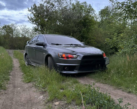 Сірий Міцубісі Lancer, об'ємом двигуна 1.5 л та пробігом 255 тис. км за 8000 $, фото 4 на Automoto.ua