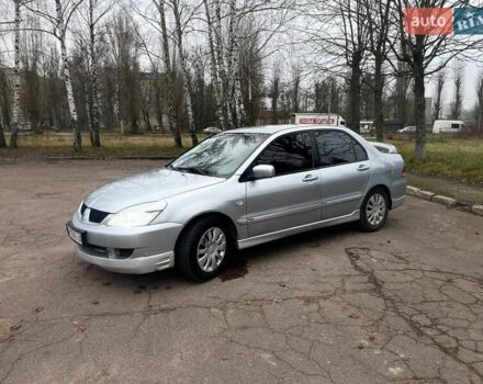 Сірий Міцубісі Lancer, об'ємом двигуна 1.6 л та пробігом 254 тис. км за 3800 $, фото 8 на Automoto.ua