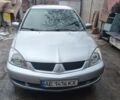 Сірий Міцубісі Lancer, об'ємом двигуна 1.6 л та пробігом 320 тис. км за 4167 $, фото 1 на Automoto.ua