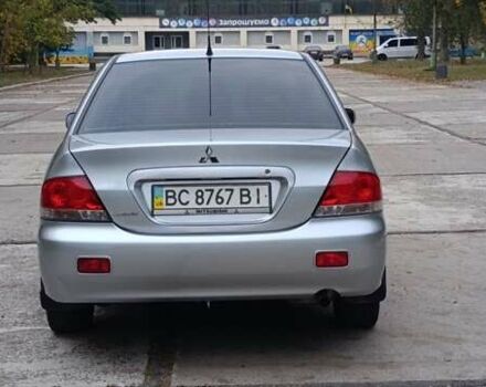 Сірий Міцубісі Lancer, об'ємом двигуна 1.6 л та пробігом 176 тис. км за 4999 $, фото 4 на Automoto.ua