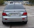 Сірий Міцубісі Lancer, об'ємом двигуна 1.6 л та пробігом 176 тис. км за 4999 $, фото 4 на Automoto.ua