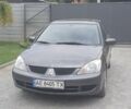 Серый Мицубиси Лансер, объемом двигателя 1.6 л и пробегом 188 тыс. км за 5700 $, фото 1 на Automoto.ua
