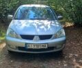 Сірий Міцубісі Lancer, об'ємом двигуна 1.6 л та пробігом 230 тис. км за 3910 $, фото 1 на Automoto.ua