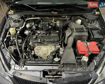 Серый Мицубиси Лансер, объемом двигателя 1.6 л и пробегом 268 тыс. км за 4600 $, фото 11 на Automoto.ua