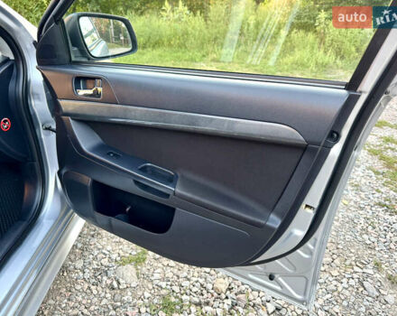 Сірий Міцубісі Lancer, об'ємом двигуна 2 л та пробігом 223 тис. км за 7390 $, фото 19 на Automoto.ua