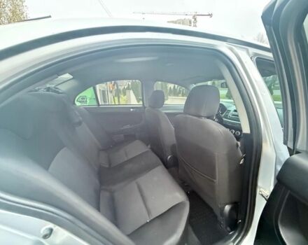 Серый Мицубиси Лансер, объемом двигателя 2 л и пробегом 210 тыс. км за 6500 $, фото 5 на Automoto.ua