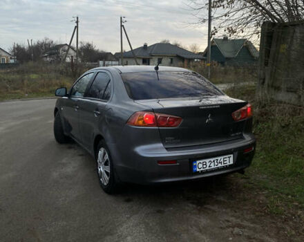 Серый Мицубиси Лансер, объемом двигателя 1.5 л и пробегом 255 тыс. км за 6500 $, фото 4 на Automoto.ua