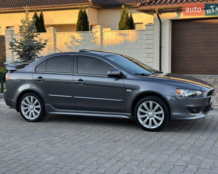 Сірий Міцубісі Lancer, об'ємом двигуна 2 л та пробігом 92 тис. км за 9800 $, фото 59 на Automoto.ua