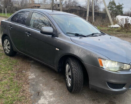 Серый Мицубиси Лансер, объемом двигателя 1.5 л и пробегом 255 тыс. км за 6500 $, фото 2 на Automoto.ua