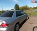 Серый Мицубиси Лансер, объемом двигателя 1.6 л и пробегом 242 тыс. км за 2650 $, фото 2 на Automoto.ua