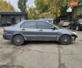 Сірий Міцубісі Lancer, об'ємом двигуна 1.58 л та пробігом 200 тис. км за 1700 $, фото 10 на Automoto.ua