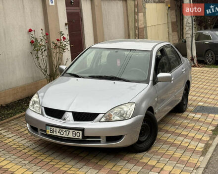 Сірий Міцубісі Lancer, об'ємом двигуна 1.6 л та пробігом 221 тис. км за 3650 $, фото 4 на Automoto.ua