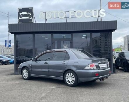 Серый Мицубиси Лансер, объемом двигателя 1.58 л и пробегом 146 тыс. км за 5490 $, фото 4 на Automoto.ua