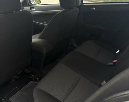 Серый Мицубиси Лансер, объемом двигателя 2 л и пробегом 211 тыс. км за 7100 $, фото 8 на Automoto.ua