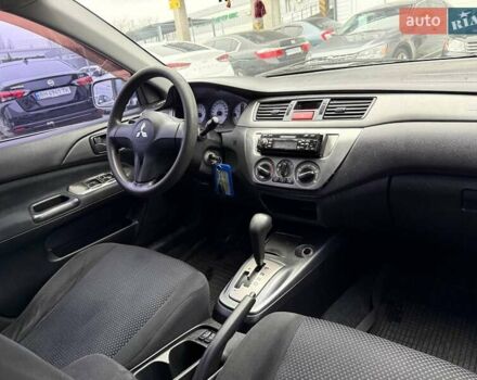 Сірий Міцубісі Lancer, об'ємом двигуна 1.6 л та пробігом 206 тис. км за 4799 $, фото 24 на Automoto.ua