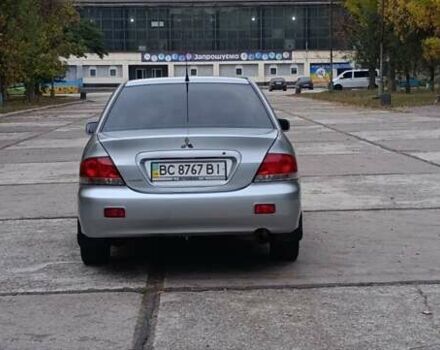 Сірий Міцубісі Lancer, об'ємом двигуна 1.6 л та пробігом 176 тис. км за 4999 $, фото 13 на Automoto.ua