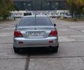 Сірий Міцубісі Lancer, об'ємом двигуна 1.6 л та пробігом 176 тис. км за 4999 $, фото 13 на Automoto.ua