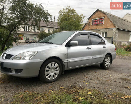 Сірий Міцубісі Lancer, об'ємом двигуна 1.58 л та пробігом 240 тис. км за 4299 $, фото 10 на Automoto.ua