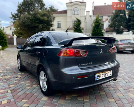 Серый Мицубиси Лансер, объемом двигателя 2 л и пробегом 212 тыс. км за 6000 $, фото 19 на Automoto.ua