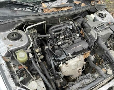 Серый Мицубиси Лансер, объемом двигателя 1.6 л и пробегом 280 тыс. км за 900 $, фото 7 на Automoto.ua