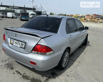 Сірий Міцубісі Lancer, об'ємом двигуна 1.6 л та пробігом 150 тис. км за 4999 $, фото 4 на Automoto.ua