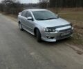 Сірий Міцубісі Lancer, об'ємом двигуна 1.5 л та пробігом 192 тис. км за 6400 $, фото 1 на Automoto.ua