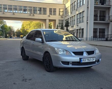 Серый Мицубиси Лансер, объемом двигателя 1.6 л и пробегом 150 тыс. км за 4700 $, фото 1 на Automoto.ua